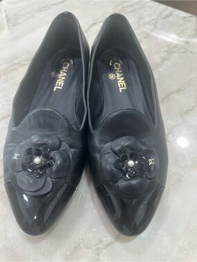 CHANEL Black Leather Camellia Pointed-Toe Flats with Pearl Detail